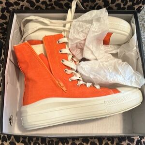 Orange tennis shoe